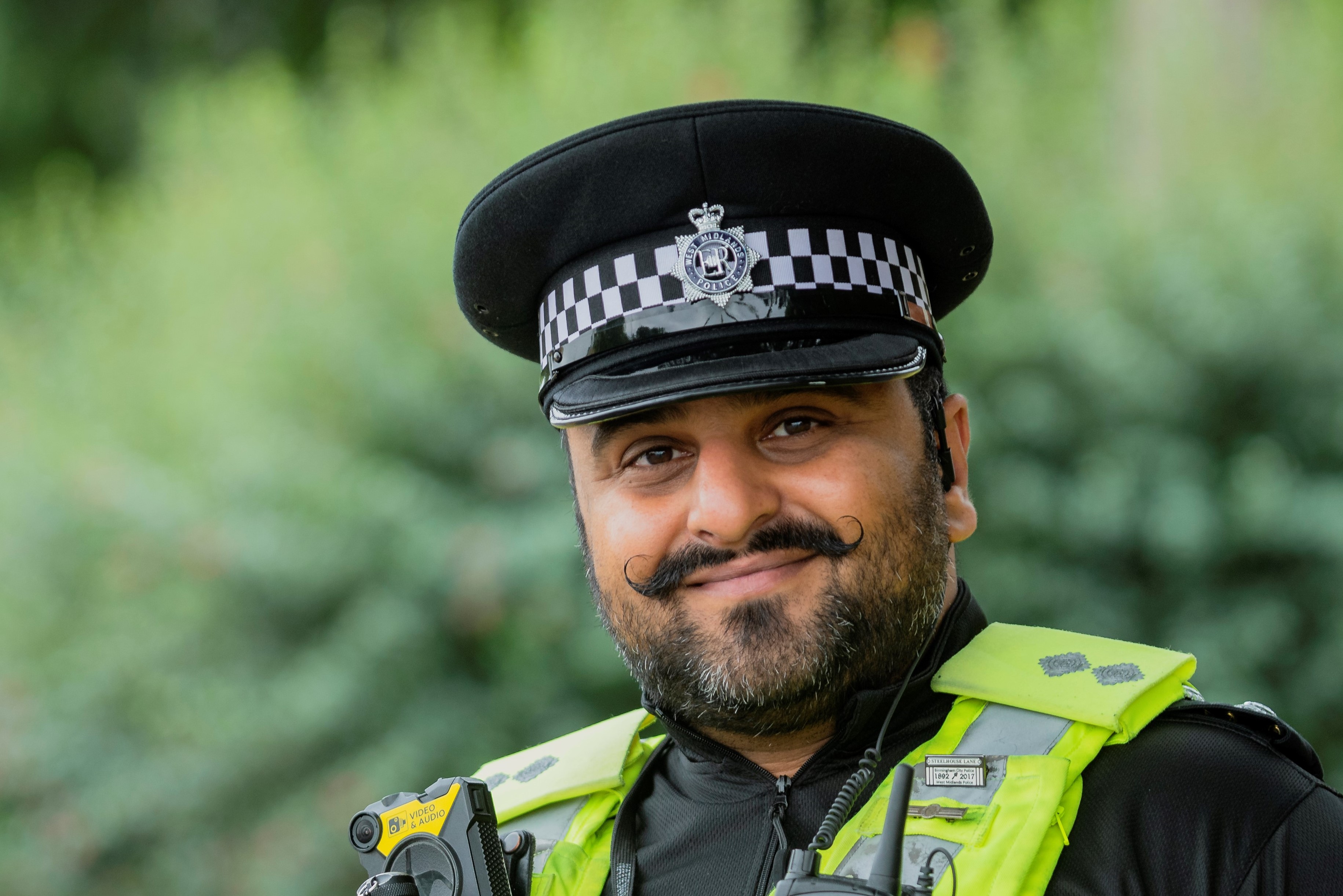 Inspector Balraj Sohal smiling to camera.