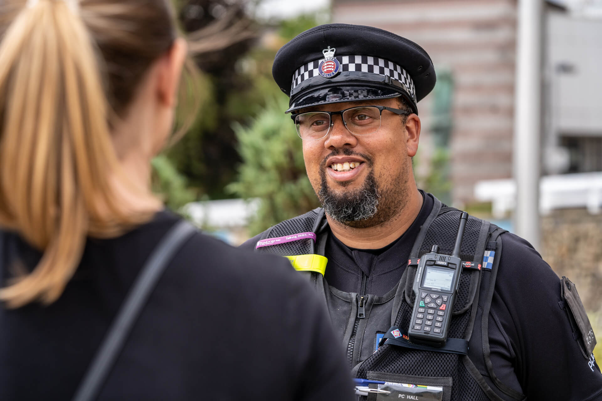 Essex police officer talking to a member of the public. 