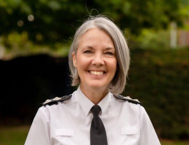 Inspector Tracy Betts, DPA president, in uniform smiling to camera.